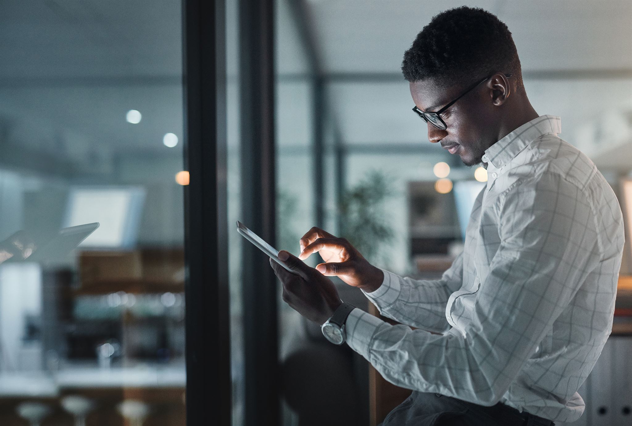 User interacting with a custom business app on tablet
